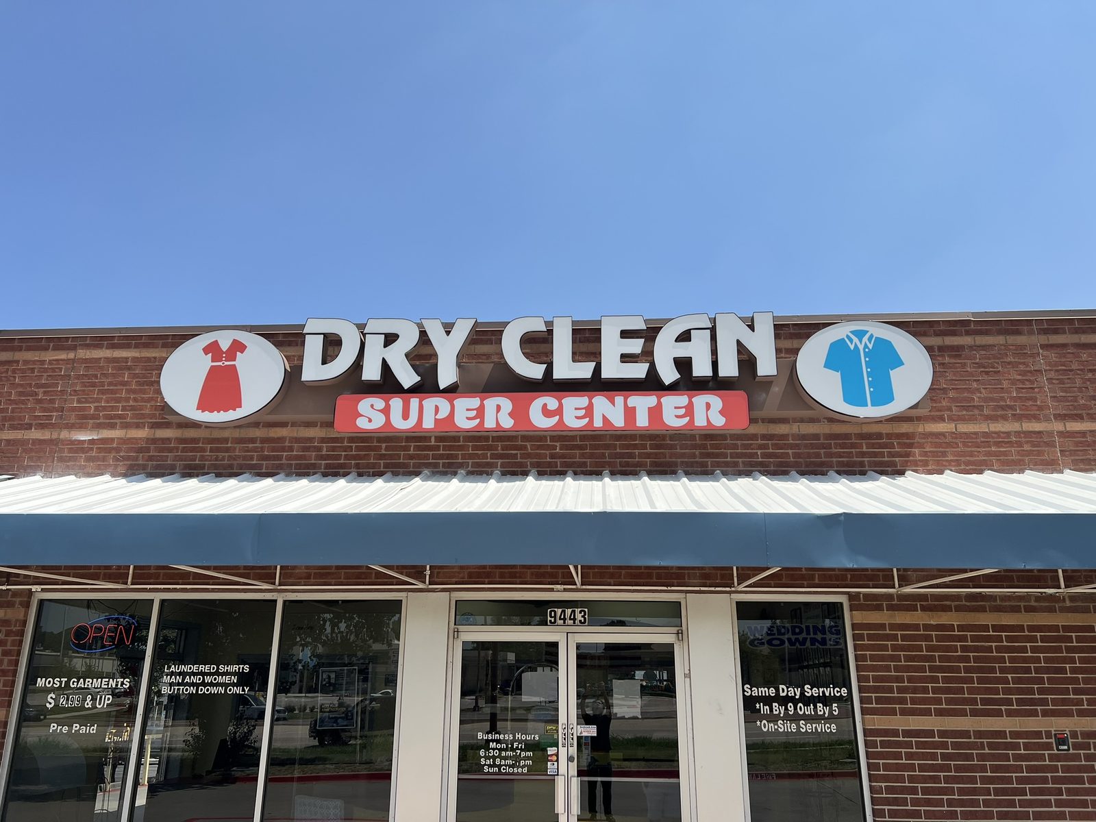 Dry Clean Super Center storefront sign and entrance in Benbrook